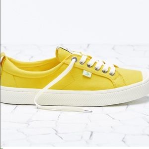 Yellow cariuma sneaker